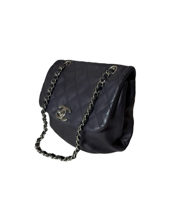 Chanel quilted lambskin Trianon messenger with adjustable strap and flap closure