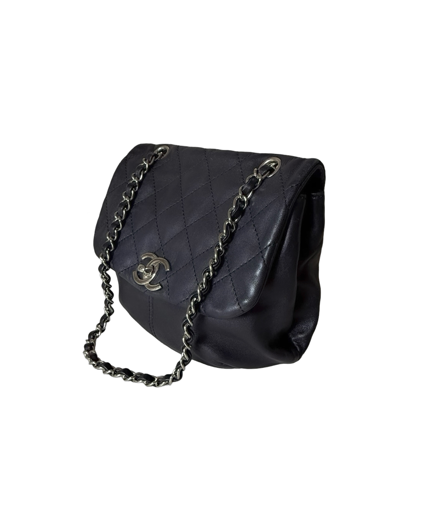 Chanel quilted lambskin Trianon messenger with adjustable strap and flap closure