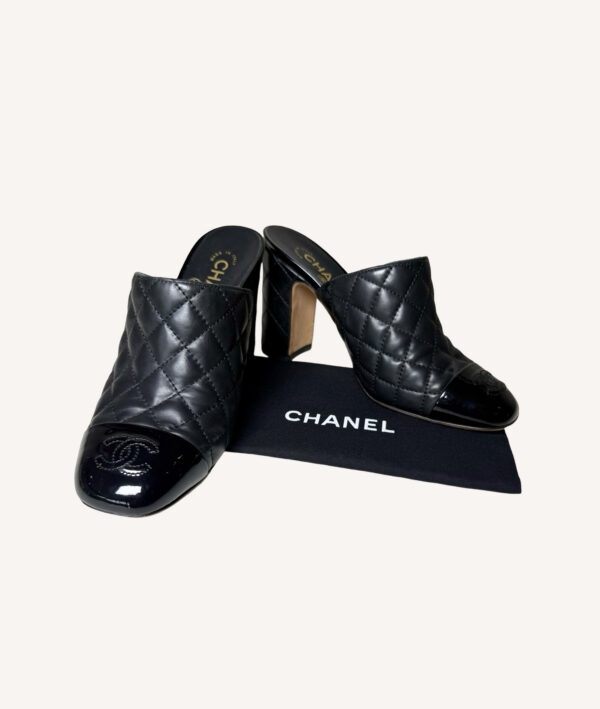 Chanel black quilted leather mules with patent cap toe and CC logo
