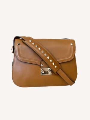 Designer Valentino saddle shoulder bag with signature Rockstud embellishments