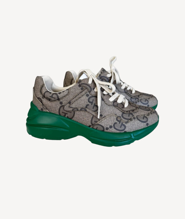 Designer Gucci Rhyton trainers featuring oversized sole and classic logo detailin