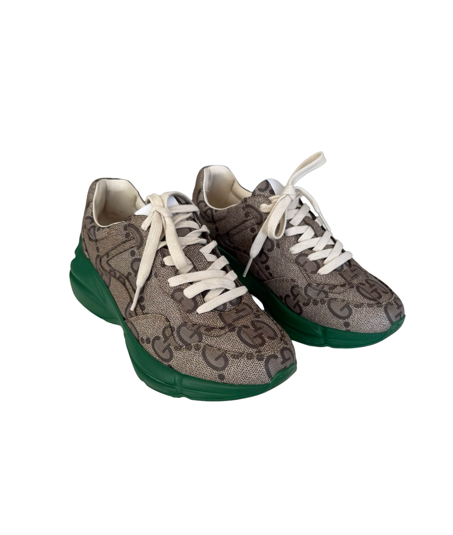 Iconic Gucci Rhyton leather sneakers with chunky sole and eye-catching logo print