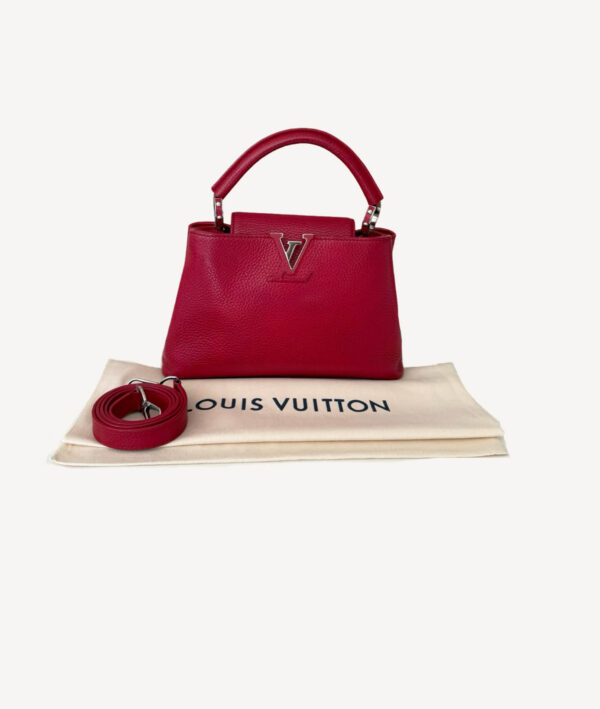 Louis Vuitton Capucines BB handbag in red Taurillon leather with top handle and silver-tone hardware