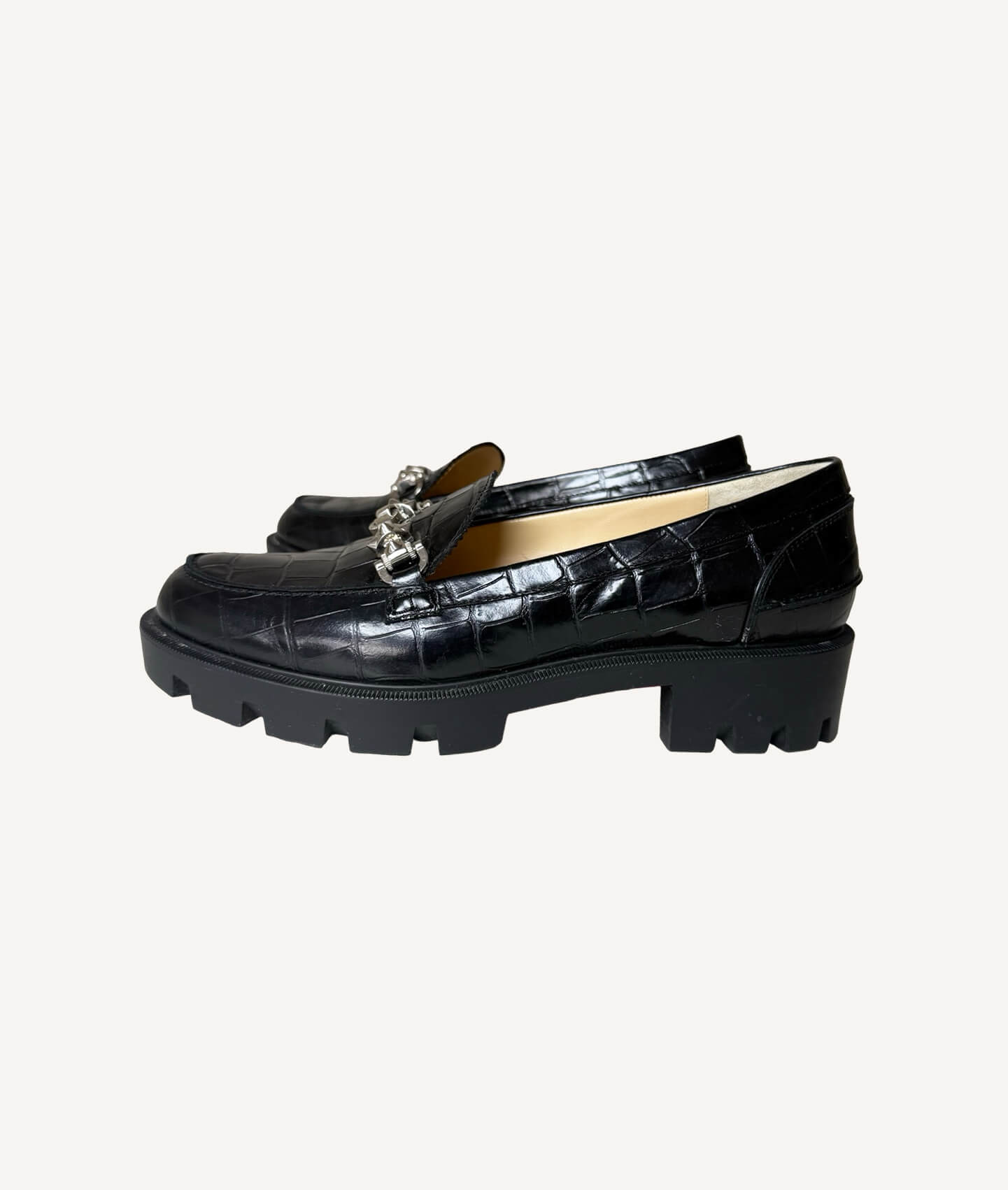 Christian Louboutin Lug Swing loafers in black croc-effect leather with embellished detail